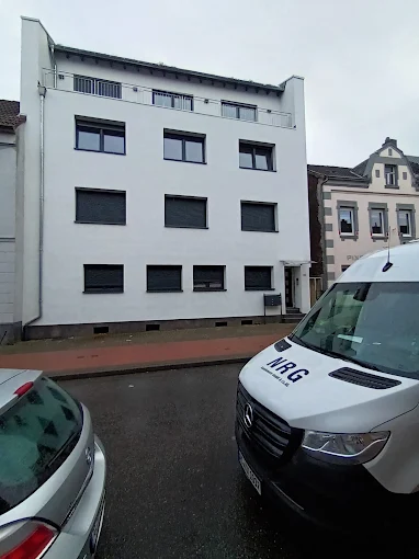 Fenster- und Türsanierung an einem Mehrfamilienhaus in Alsdorf durch NRG Bauelemente