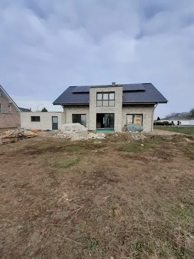 Neubau eines Einfamilienhauses in Herzogenrath mit neuen Fenstern und Türen