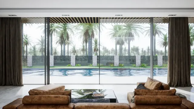 Aluminium-Schiebetür Aluprof MB-Skyline mit schmalen Rahmen und Panoramablick auf Pool und Garten